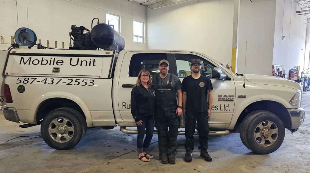 The Rusted Nuts Mechanical team comprised of Myron along with his son and wife